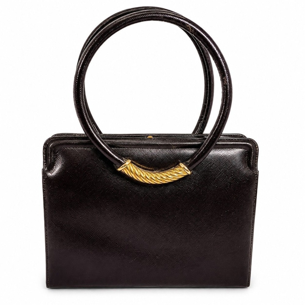 ⚜️9. Morris Moskowitz textured leather handbag.⚜️